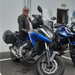 Jan Waters, instructor at Norwich Diss and Ipswich, sitting on her bike